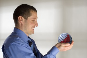 young business men holding blue sphere with graph concept