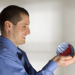 young business men holding blue sphere with graph concept