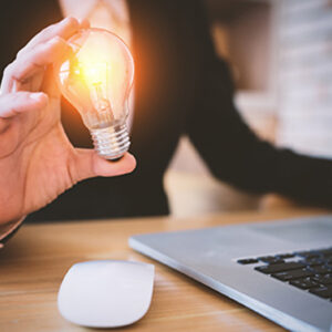 Photo of business people hands applauding at conference