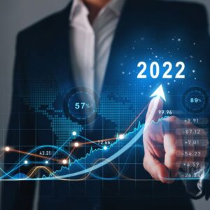 Businessman draws  increase arrow graph corporate future growth year 2021 to 2022.   Development to success and motivation